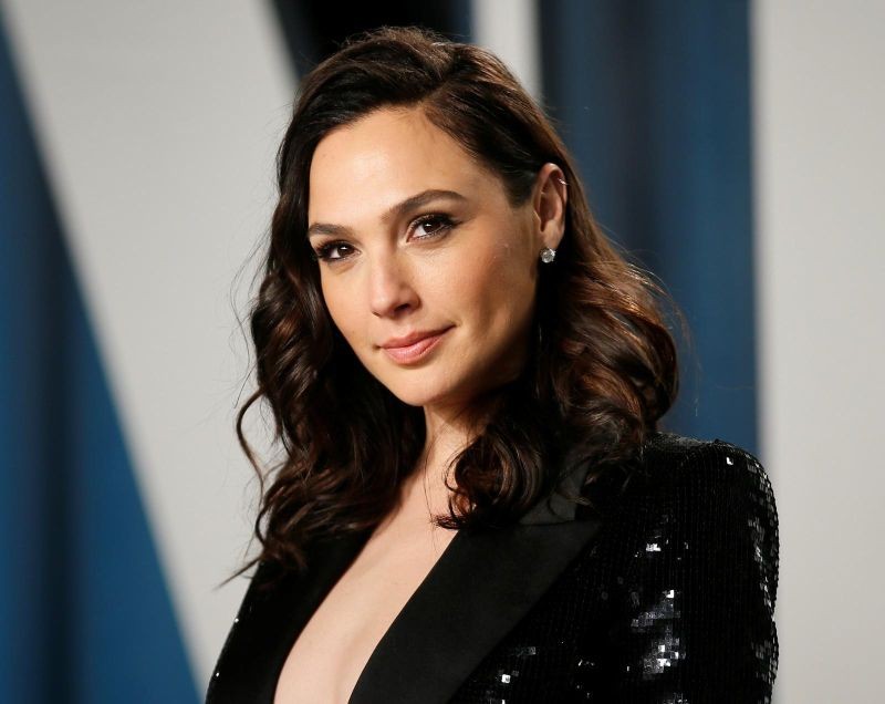 FILE PHOTO: Gal Gadot attends the Vanity Fair Oscar party in Beverly Hills during the 92nd Academy Awards, in Los Angeles, California, U.S., February 9, 2020. Gadot stars in "Wonder Woman 1984" which is set for release on Dec. 25, 2020. REUTERS/Danny Moloshok/File Photo
